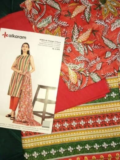 Alkaram MTJ Lawn 3 Piece Suit with vibrant floral and geometric patterns.