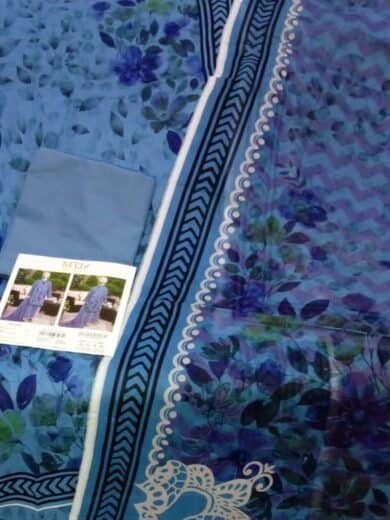 Elegant blue floral lawn fabric for stylish summer wear.